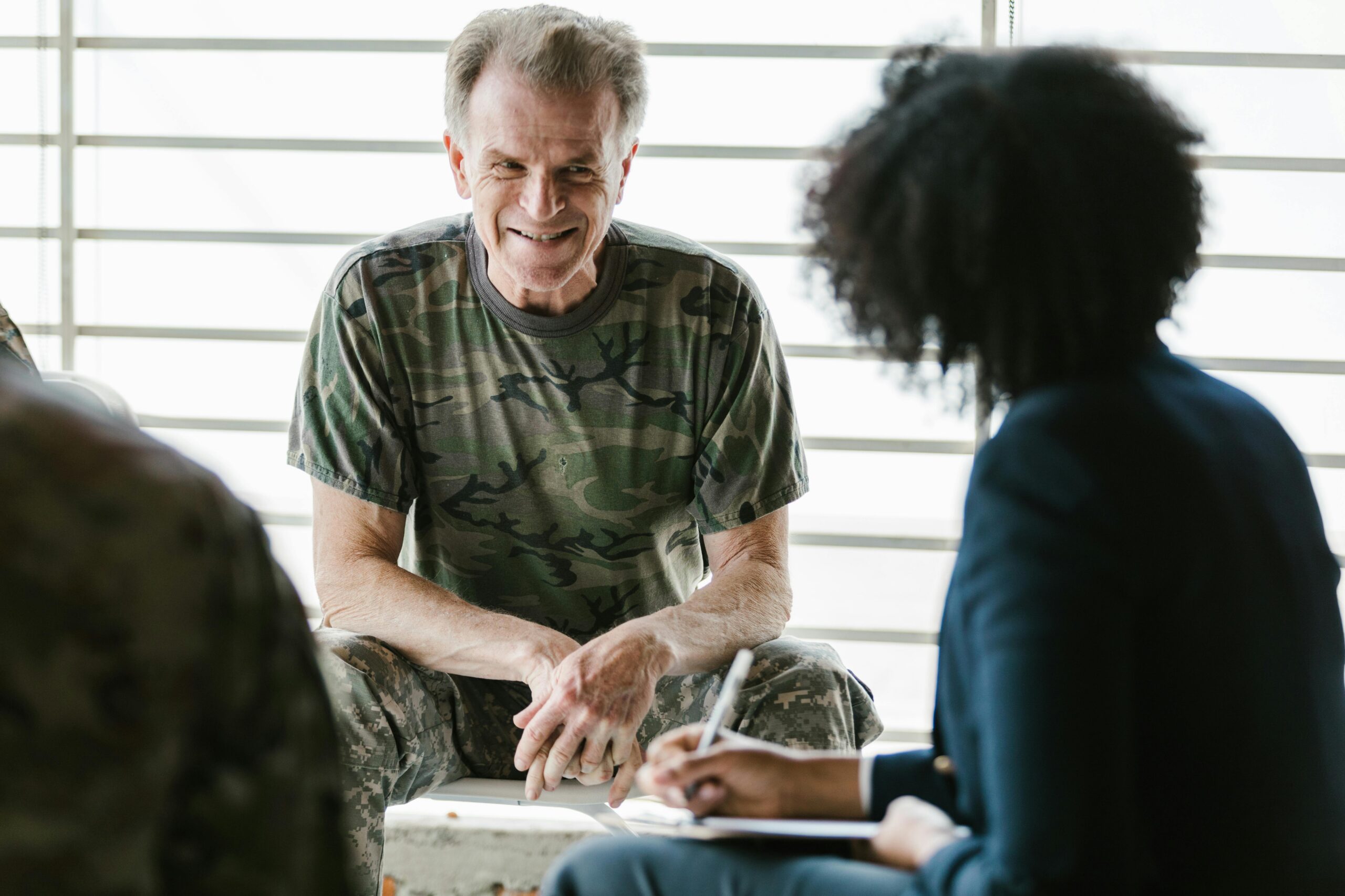therapist talking with client about trauma therapy in Southlake TX