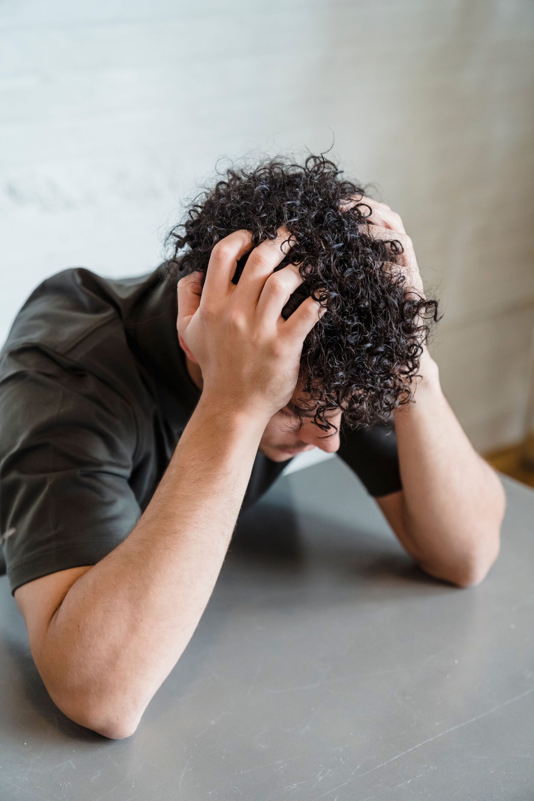 Adult attending virtual OCD therapy from home with an OCD therapist in Rockville, MD.
